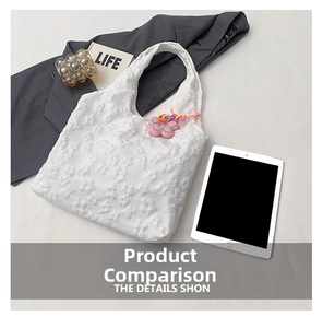White floral tote bag showing large capacity by comparing with an iPad and lifestyle props
