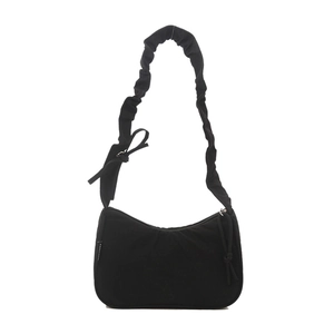 Minimalist black crescent shoulder bag with pleated cloud strap and side bow detail