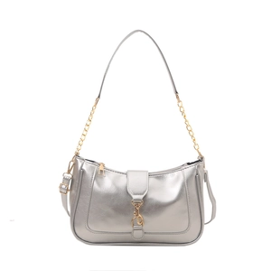 Silver metallic shoulder bag with gold chain strap and elegant curved flap design