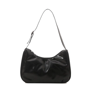 Minimalist black glossy hobo bag with adjustable strap and sleek crescent moon design