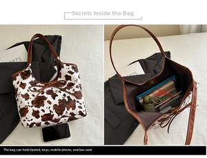 Vista interna dettagliata di una borsa tote con stampa mucca e grande capacità interna