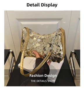 Detailed view of large gold sequins and metal chain on stylish crescent hobo bag