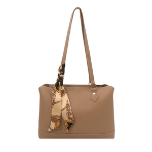 Brown faux leather tote bag with elegant floral scarf detail for commute use