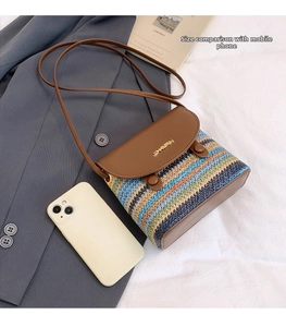 Straw rainbow bucket bag size comparison showing mini colorful crossbody with a smartphone