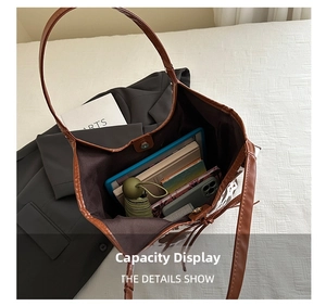 Detail showing high-capacity animal print tote bag interior with daily essentials