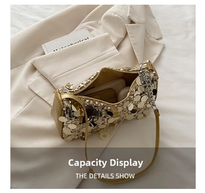 Detail of golden sequin handbag showing internal capacity for phone and cosmetics