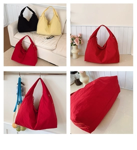 Detail showing high-capacity minimalist hobo bags in red, black and soft yellow colors