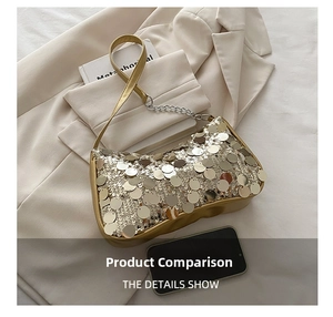 Close-up of a gold sequin underarm bag with elegant silver chain and leather strap