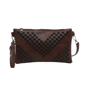 Deep brown studded envelope clutch bag with V-shaped rivets and detachable straps