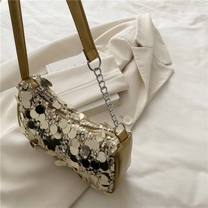 Sparkly sequin baguette bag with beige leather strap and silver chain detail