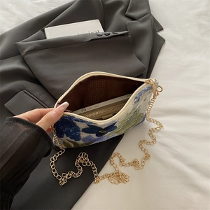 Floral embroidered envelope clutch bag with sequins and golden metal chain strap
