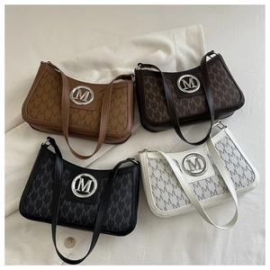 French vintage shoulder bags in four colors with M monogram print and round metal logo