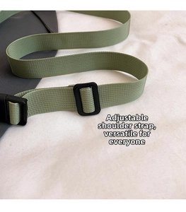 Vue détaillée de la bandoulière tissée réglable en vert avocat pour sacs à bandoulière