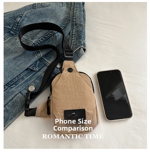 Khaki nylon waist bag size comparison with a smartphone and adjustable black strap