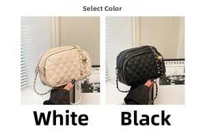 Detailed comparison of white and black quilted chain crossbody bags with gold ball charms