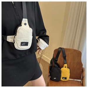 Nylon mini crossbody chest bags in cream, yellow and black with adjustable straps