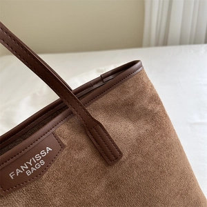 Brown suede tote bag with leather handles and white FANYISSA BAGS logo detail