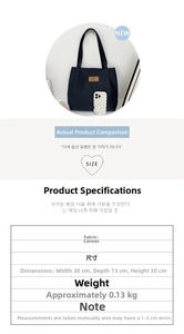 Detailed size chart for black canvas tote bag with smartphone for scale reference