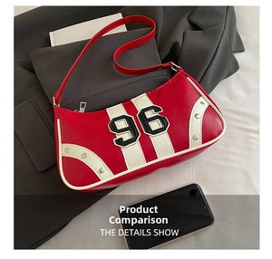 Detail of red crescent shoulder bag with white stripes and number 96 patch embroidery