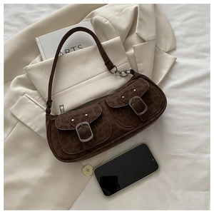 Detail of coffee leopard print underarm bag with double buckle pockets and metal chain