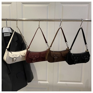 Detailed view of four retro baguette bags in beige, burgundy, tan and black matte finish