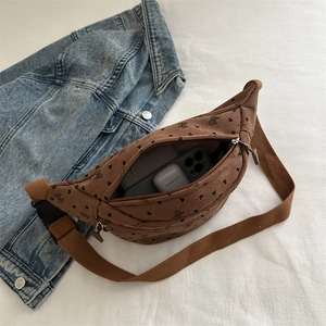 Brown corduroy waist bag with snoopy pattern and adjustable strap showing inner space