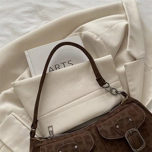 Retro dark brown suede shoulder bag with dual front flap pockets and metallic hardware
