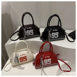 Glossy Boston handbags in four colors featuring Los Angeles 95 print and chain detail