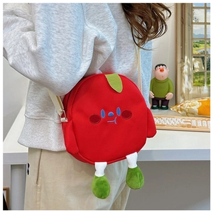 Detail of red cartoon canvas crossbody bag with cute embroidery and 3D plush legs