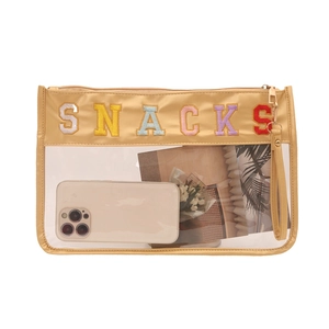 Transparent PVC waterproof toiletry bag with SNACKS patch and golden leather handle