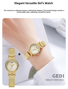 Close-up of golden women's quartz watch with mesh strap and rhinestone dial markers