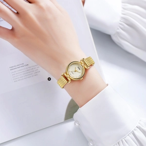 Elegant gold mesh strap quartz watch for women with minimalist round dial and metal case