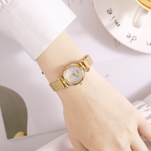 Elegant GEDI women's gold quartz watch with mesh strap and minimalist round dial