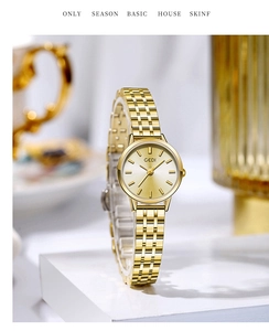 Detailed macro view of GEDI minimalist gold stainless steel women's quartz watch