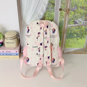 Cute large capacity cartoon backpack for students with dog prints and pink straps