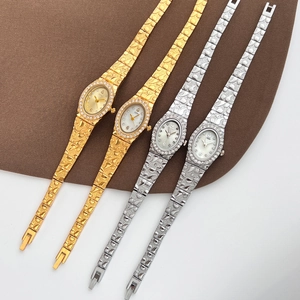 Orologi al quarzo di lusso da donna con quadranti ovali con strass e cinturini in metallo