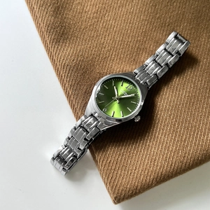 Elegant silver quartz watch for women with sunray green dial and metal link bracelet