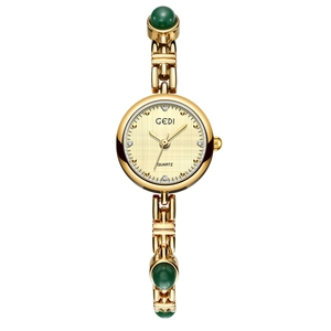 GEDI luxury women's quartz watch with gold metal strap and green amber stone accents