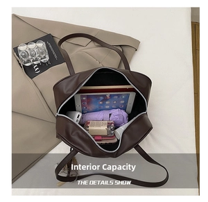 Detail showing the large interior capacity of this brown leather tote bag with daily items