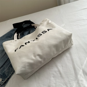 Minimalist canvas tote bag with FANY·ISSA letter print and large capacity for women