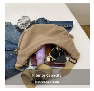 Corduroy crescent crossbody bag showing spacious interior with daily essentials