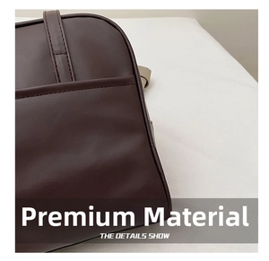 Detailed close-up showing the premium dark brown leather texture and stitching of the tote bag