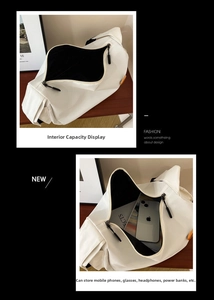 Detail view of large white nylon messenger bag interior showing spacious storage space