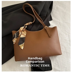 Brown PU leather bucket bag with decorative silk scarf shown next to a smartphone for scale