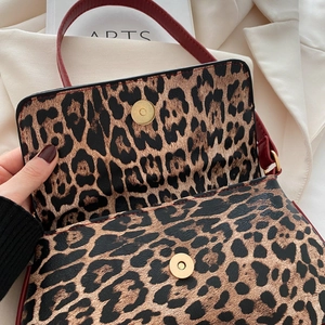 Chic leopard print large capacity tote bag with red leather straps and magnetic closure