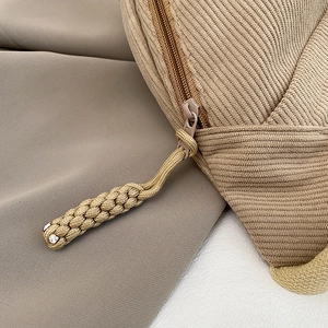 Khaki corduroy shoulder bag with large capacity and hand-woven zipper puller details