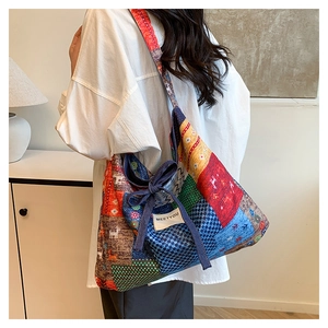 Detailed patchwork floral tote bag with a blue bow and MEETYOU label for daily casual wear