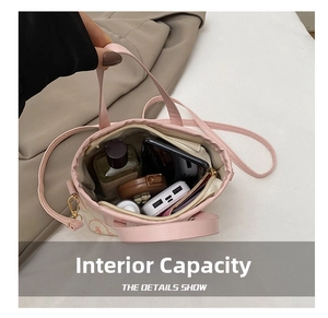 Macro view showing internal capacity of the pink bucket bag for phone and cosmetics