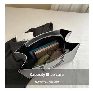 Interior view of tote bag showing large capacity for tablet, umbrella, and wallet
