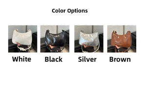 Detail view of glossy leather handbags in white, black, silver, and brown colors